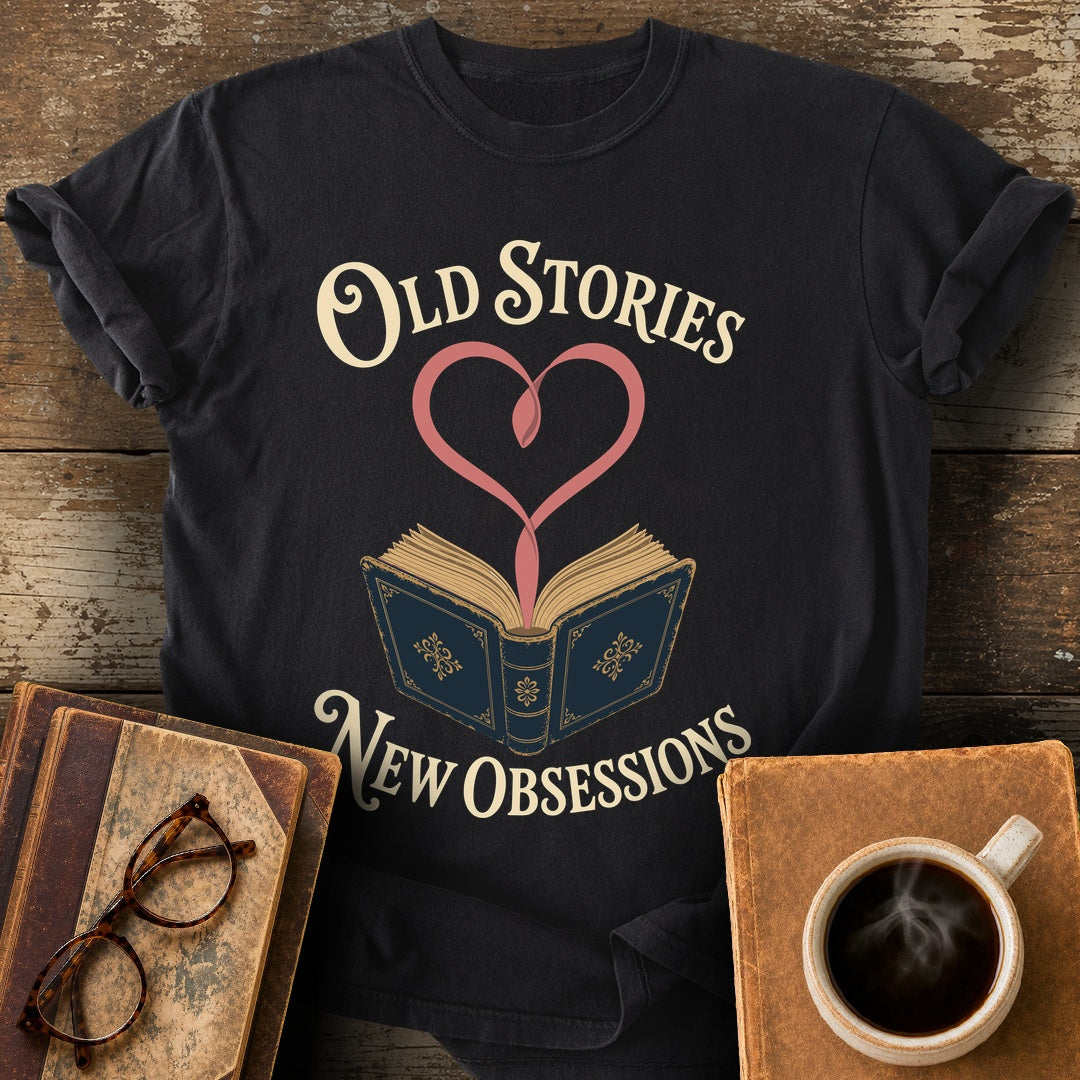 Old Stories, New Obsessions Tee - black shirt mockup